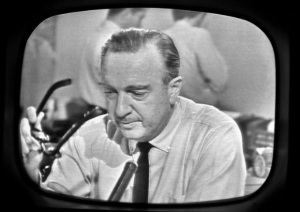 Walter Cronkite covers the story (Getty Images)
